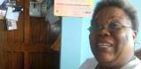 Dorotea Wilson speaking to camera, screenshot of YouTube video